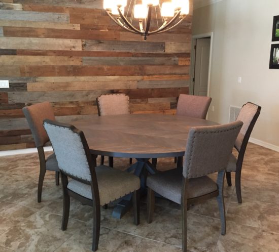 Round dining table with trestle base