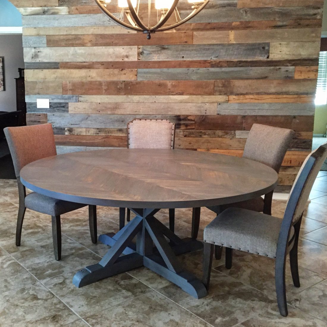 Round dining table with trestle base