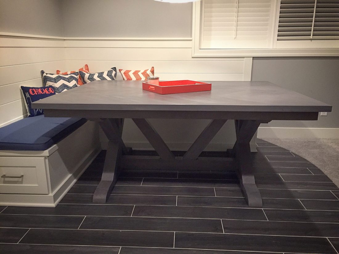 Custom chevron style dining table with x trestle legs