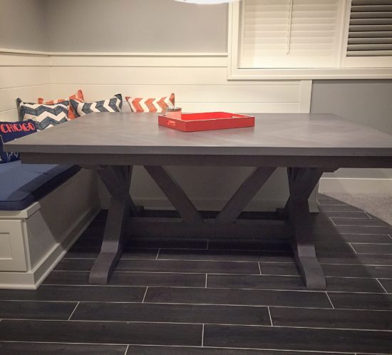 Custom chevron style dining table with x trestle legs