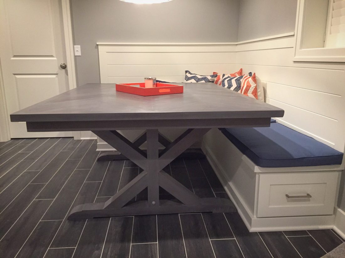 Custom chevron style dining table with x trestle legs