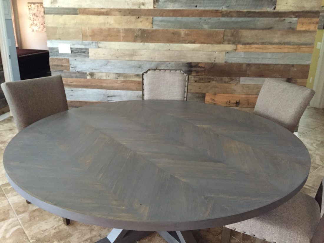 Round dining table with trestle base