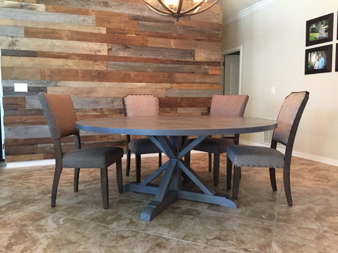 Round dining table with trestle base