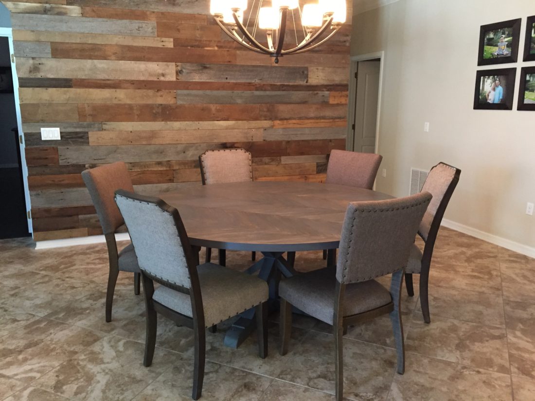 Round dining table with trestle base