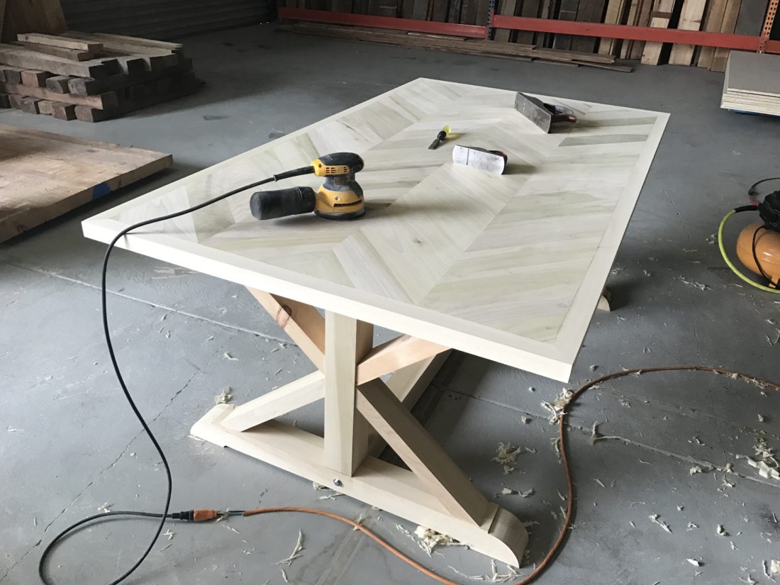 chevron table with trestle base