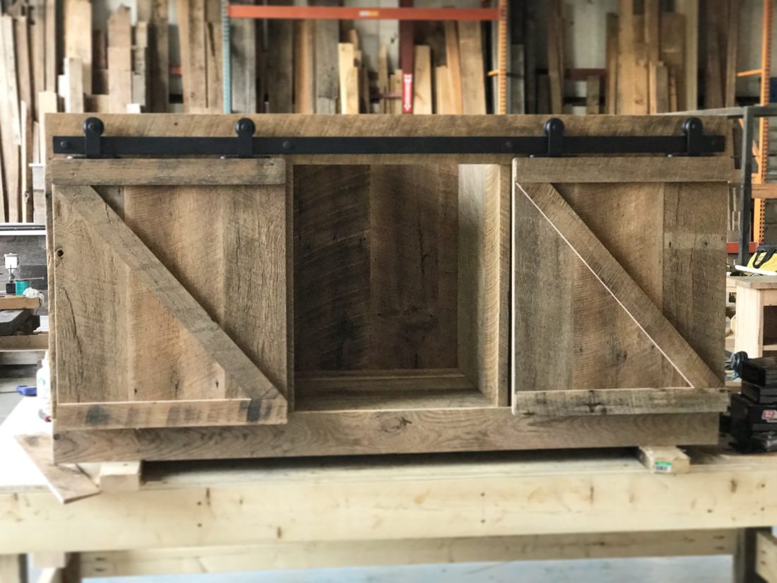 reclaimed wood media cabinet with z pattern barn doors