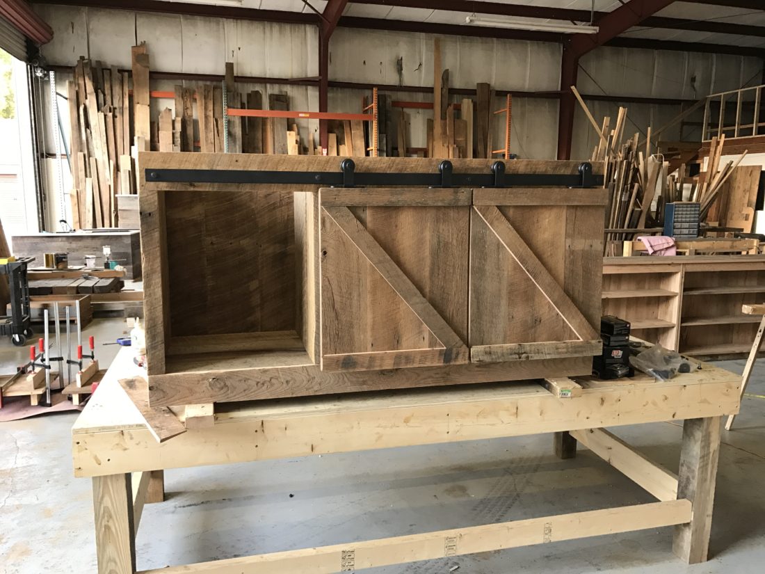 reclaimed wood media cabinet with z pattern barn doors