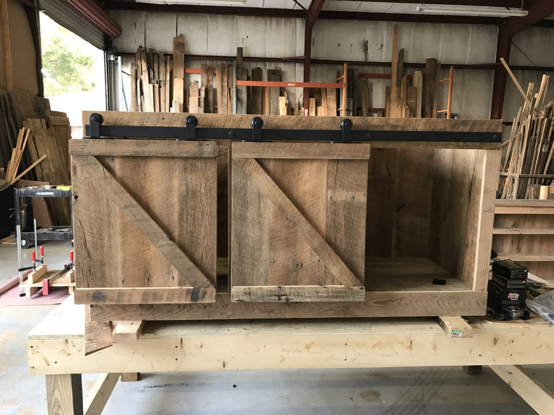 reclaimed wood media cabinet with z pattern barn doors