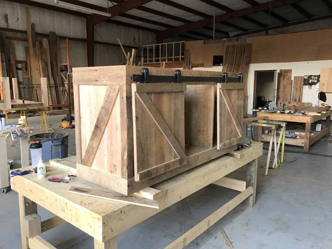 reclaimed wood media cabinet with z pattern barn doors